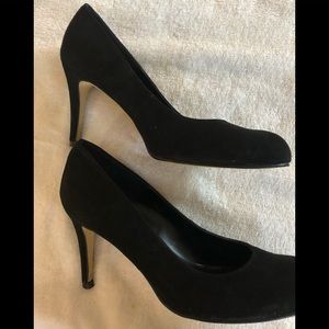 Black suede pumps